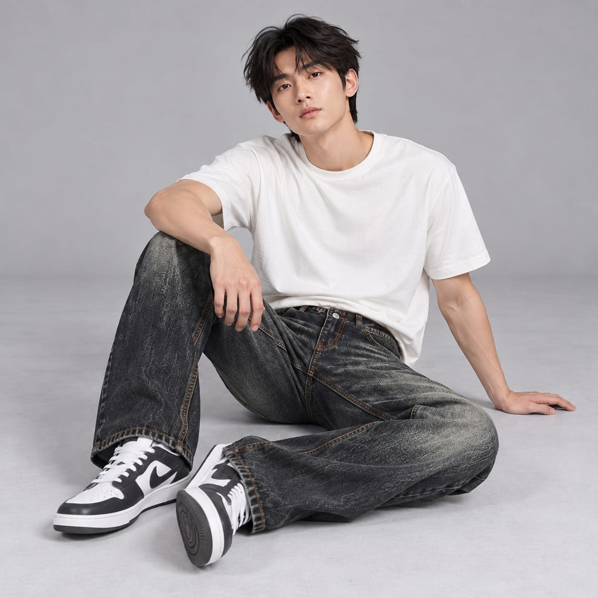 Wide leg spray wash jeans