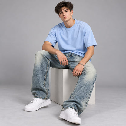 Wide leg spray wash jeans