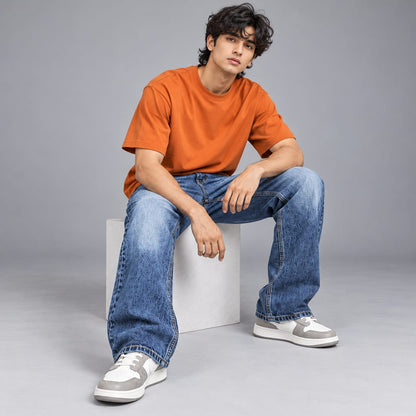 Wide leg spray wash jeans