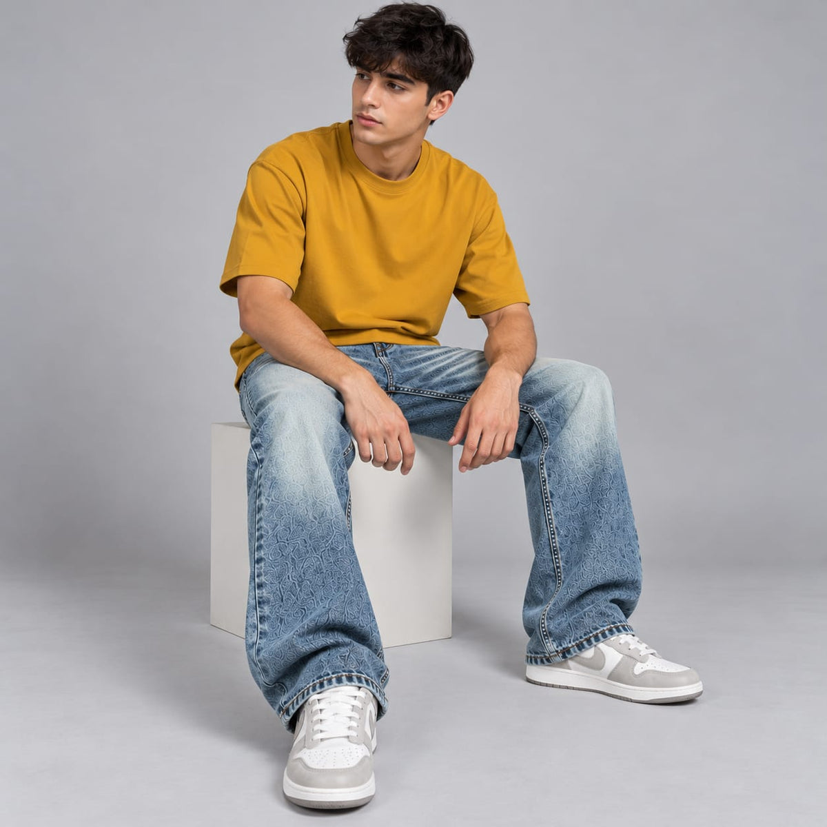 Wide leg spray wash jeans