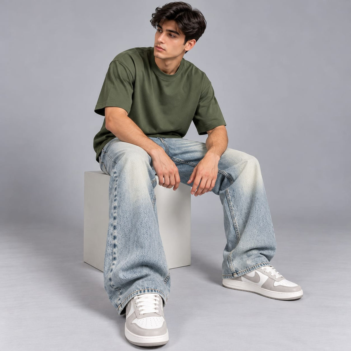 Wide leg spray wash jeans