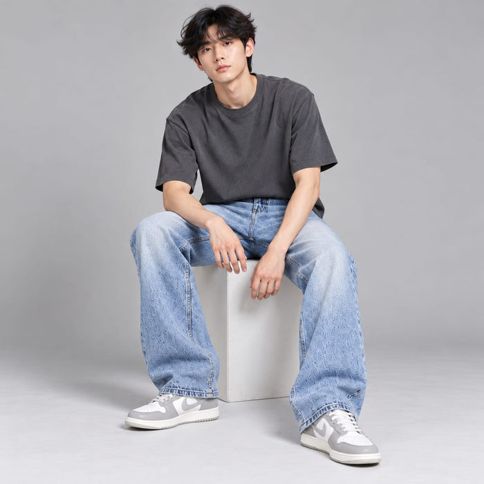 Wide leg spray wash jeans